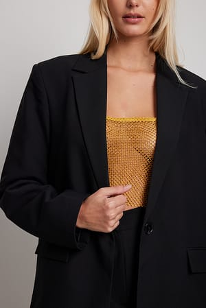 Gold Skinnende top med broderi