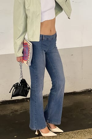 Mid Blue Vaqueros de talle bajo con pierna estrecha