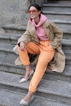Light Orange Spitz zulaufende Bio-Sporthose