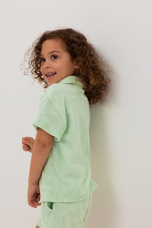 Camisa de felpa