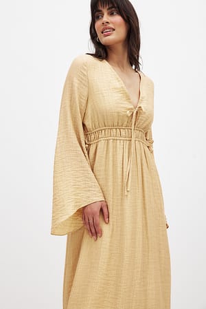 Yellow Kaftanjurk met strik aan de voorkant