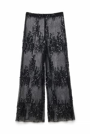 Black weite Plissee-Hose mit Pailletten