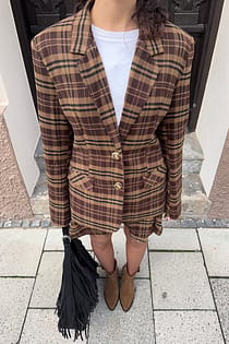 Ternet blazer med markeret talje