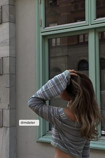 Strikket glitrende top med lange ærmer