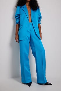 Pantalon taille mi-haute ornementé