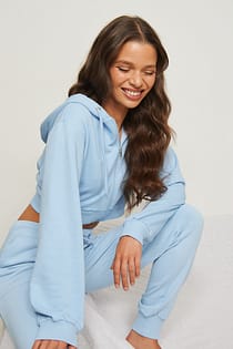 Ekologisk hoodie med dragkedjedetalj