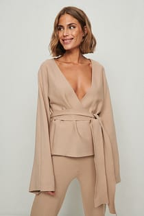 Gebreide wikkelsweater met wijde mouwen