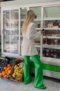 Återvunna utvängda skräddasydda kostymbyxor