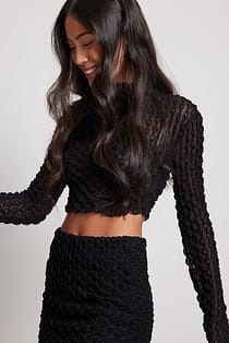 Top de cuello alto con forma