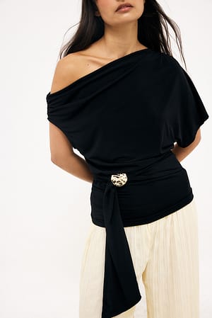 Black Asymmetrisk top i jersey med spænde