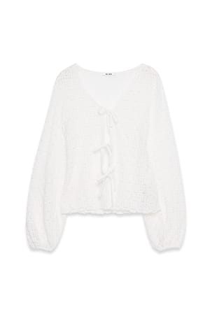 Offwhite Topp med knyt och ballongärmar