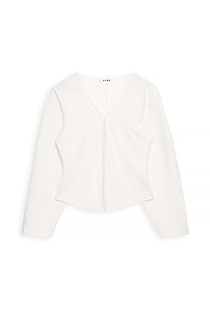 Offwhite Bouclé topp med lange ermer