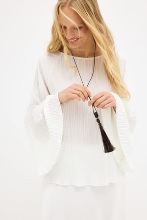 Offwhite Blusa plisada con capa