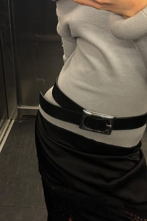 Grey Strikket topp med polstret detalj