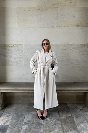 Beige Lang trenchcoat