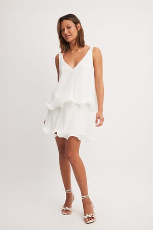White Minifalda con bajo avolantado