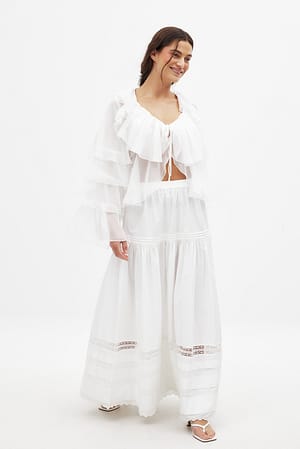 Offwhite Top mit Rüschen