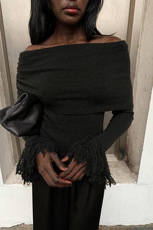 Black Gebreide off-shoulder trui met franjes