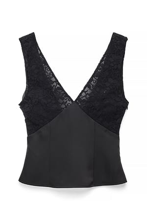 Black Topp med blondedetaljer