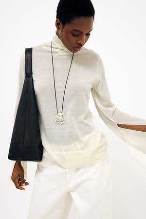 Offwhite hochgeschlossenes Merinomischstricktop