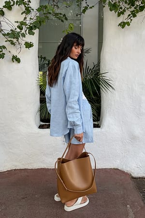 Beige Sacktasche