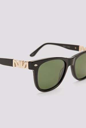 Black Klassieke zonnebril met rond montuur van acetaat