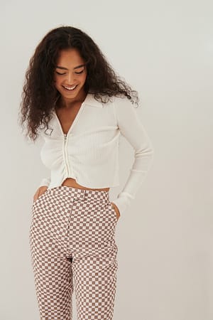 Offwhite Cárdigan de punto acanalado con volantes y cremallera