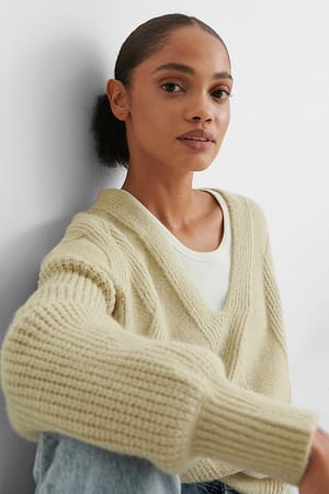 Beige langer Strickpullover