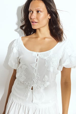 Offwhite Top met pofmouwen en patroon