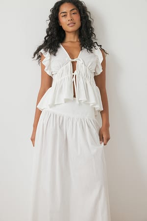 Offwhite Oberteil mit Schultervolant