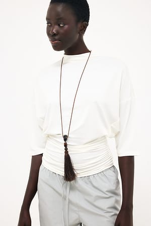 White Soft Line jerseytop med tragtformet hals