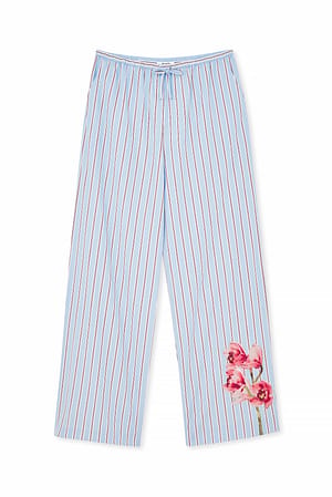 Blue Stripe Randiga byxor med tryck