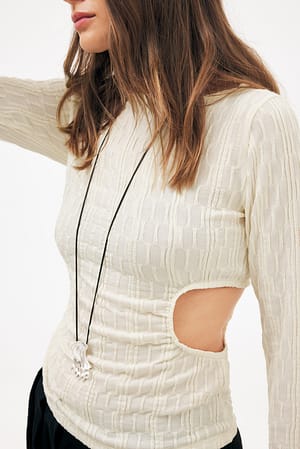 Offwhite Gestructureerde top met cut-out