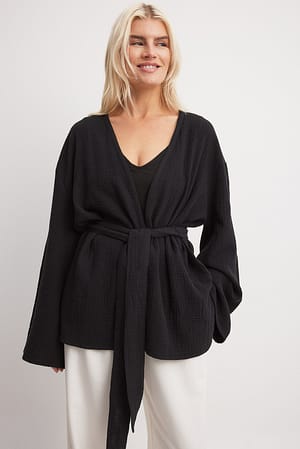 Black Blusa estructurada fluida con cinturón