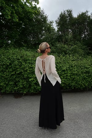 Offwhite Top con nudo en la espalda de manga larga y tirantes