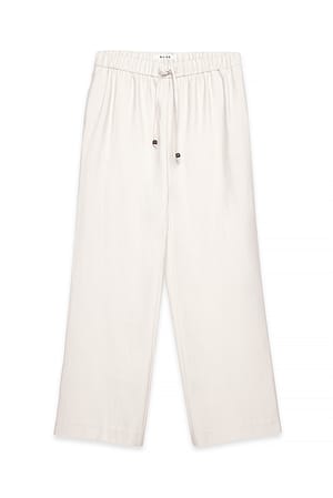 Cream Hose mit weitem Bein und mittlerer Taille
