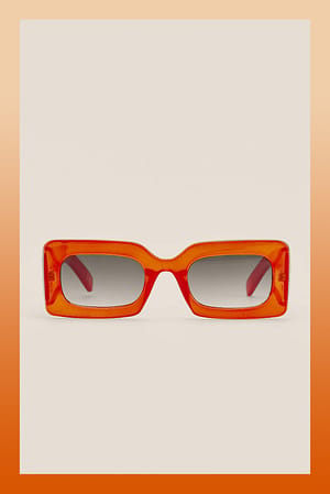 Orange Sonnenbrille mit großem Rahmen
