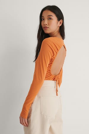 Orange Top mit Kordelzug und offenem Rücken