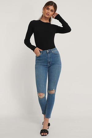 Mid Blue Hullete skinny jeans med høyt liv