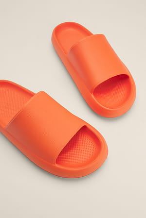 Orange Gummi-Slippers