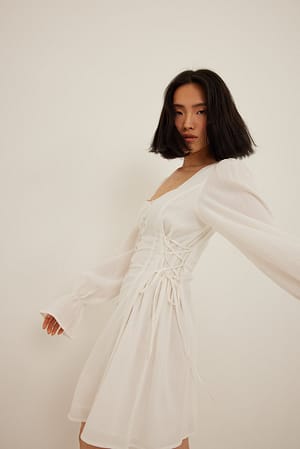 White Zacht katoenen jurk met kantdetail op de zijde