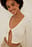 Top con botones de perla
