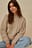 Grobmaschiger Zopfstrickpullover