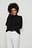 Kurzer hochgeschnittener Strickpullover