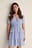 Vestido dobby smock con volantes reciclado
