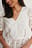 Bluse med flæser i broderie anglaise