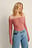 Gerecycleerd top met knopen en off-shoulder
