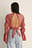 Recycled blus med öppen rygg