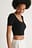 Gerecycleerd babylock top met decolleté