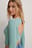 Geribde top met gedraaid detail